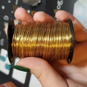 Spool of gold wire jewelry making wire wrapping supplies